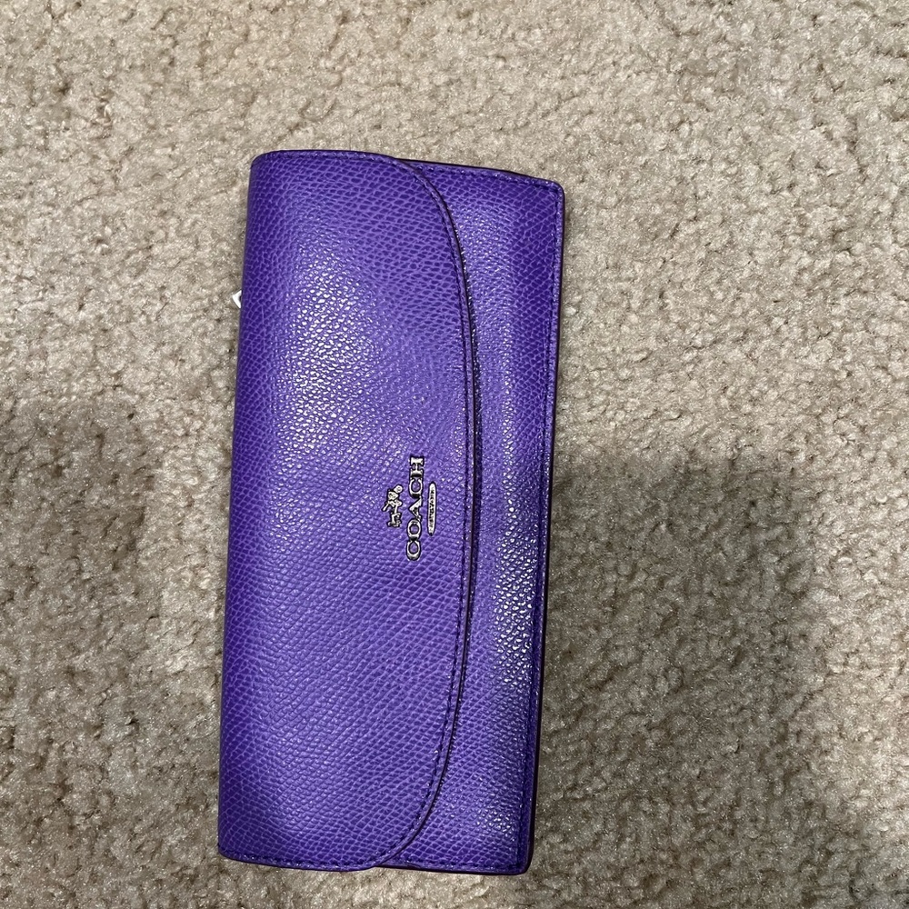 Purple Coach wallet. Great condition.